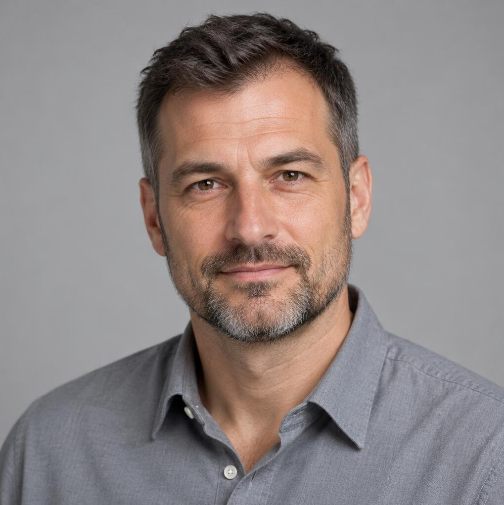 Portrait of a bearded man looking at the camera