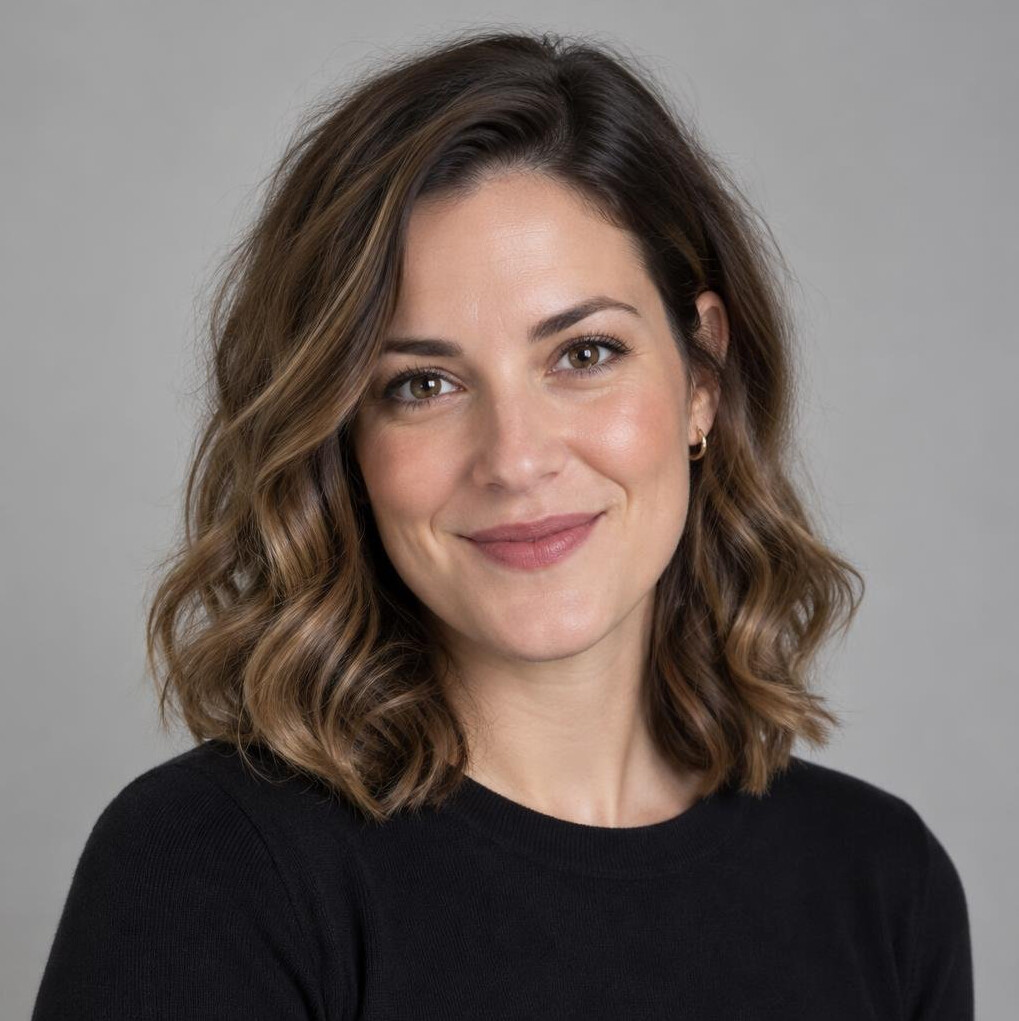 Portrait of a woman with wavy hair smiling